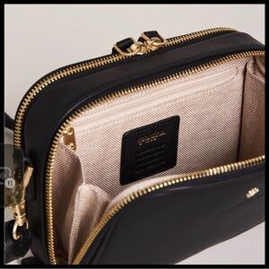 I black crossbody bag mint condition. NWT